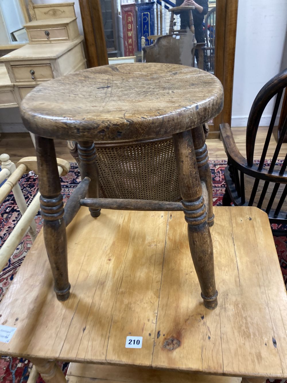A Victorian pine two tier washstand, width 62cm, two towel rails and a provincial stool